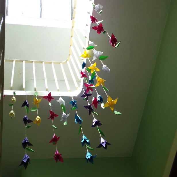 Paper flowers in the stairwell